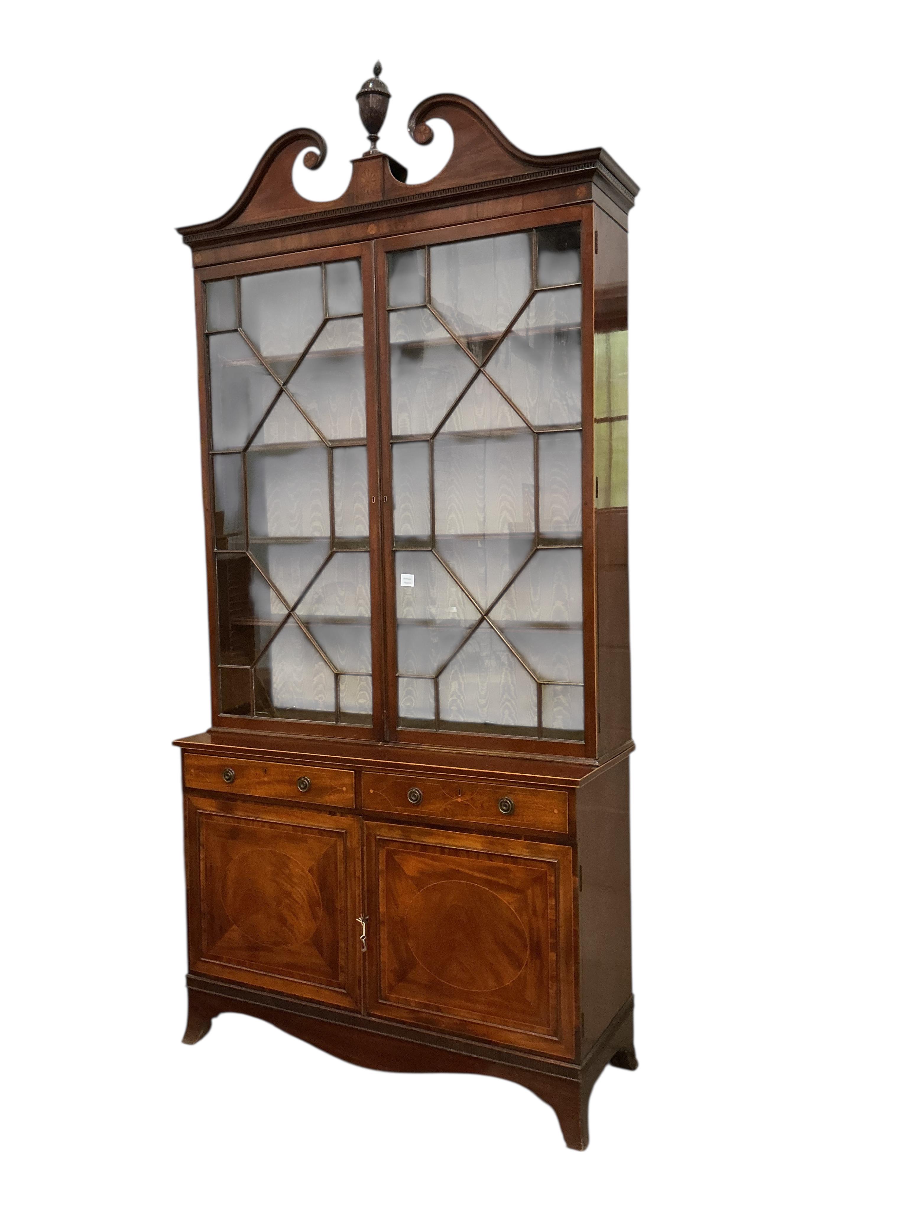 A George III and later inlaid mahogany library bookcase, width 130cm, depth 46cm, height 270cm